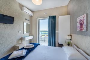 Postel nebo postele na pokoji v ubytování Argyro Rent Rooms