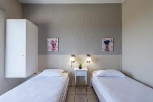 Postel nebo postele na pokoji v ubytování Argyro Rent Rooms