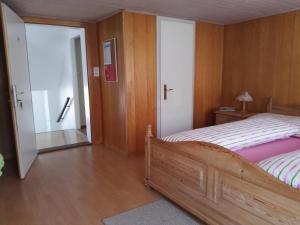 Postel nebo postele na pokoji v ubytování Pizzeria-Pension Gambrinus