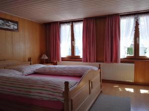 Postel nebo postele na pokoji v ubytování Pizzeria-Pension Gambrinus