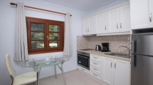 A cozinha ou cozinha compacta de Anna Maria - Vanessa Apartments