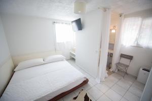 Postel nebo postele na pokoji v ubytování Locastudio - Pomme Kanel