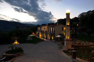 a house with a light on the side of a road at Costadoro in Costa dʼOneglia