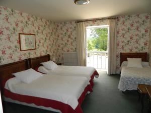 Postel nebo postele na pokoji v ubytování Château de Mavaleix