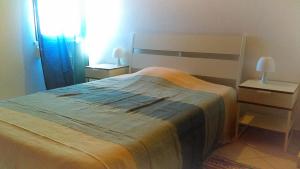 Postel nebo postele na pokoji v ubytování Lisbonne rive sud du tage