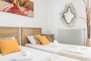 Posteľ alebo postele v izbe v ubytovaní Panos Apartment Naousa