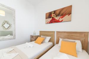 Posteľ alebo postele v izbe v ubytovaní Panos Apartment Naousa