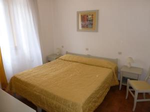 Voodi või voodid majutusasutuse Albergo Dei 10 Colori toas