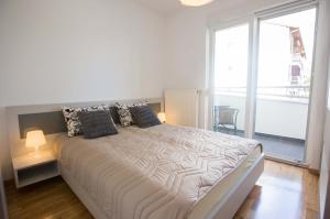 Postel nebo postele na pokoji v ubytování Jelena Apartment