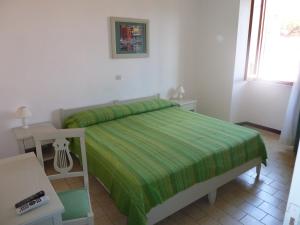 Voodi või voodid majutusasutuse Albergo Dei 10 Colori toas