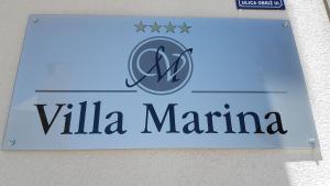 a sign for the villa marina logo at Villa Marina in Omiš