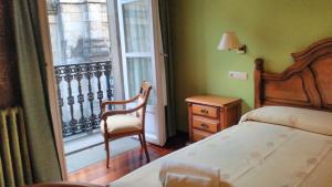 Postel nebo postele na pokoji v ubytování PICO SACRO II HOTEL Santiago de Compostela