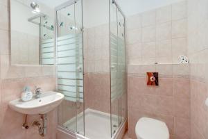 Kúpeľňa v ubytovaní Apartments Bellus Mare + 37 fotografií