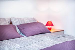 Postel nebo postele na pokoji v ubytování Apartments Marina