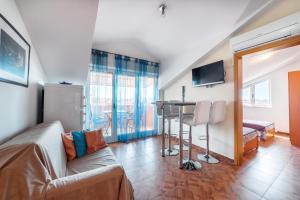 TV a/nebo společenská místnost v ubytování Apartments Marina