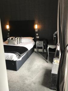 Voodi või voodid majutusasutuse Chapel Cross Guesthouse toas