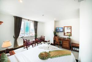 TV a/nebo společenská místnost v ubytování Relax Hotel