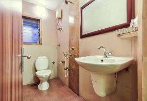 Koupelna v ubytování Hotel Metro Palace Bandra
