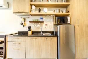 Cuisine ou kitchenette dans l'établissement Apartments at The Bliss Condo by Lofty