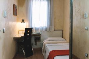 Postel nebo postele na pokoji v ubytování Hotel Castillo de Javier