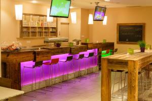 TV a/nebo společenská místnost v ubytování Explorer Hotel Zillertal