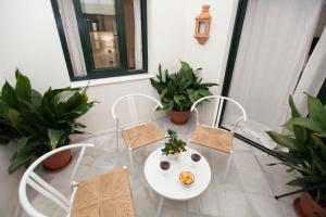 Patio lub wspólna przestrzeń na świeżym powietrzu w obiekcie GR Suites Boutique Picasso