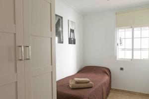 Posteľ alebo postele v izbe v ubytovaní Attic Valencia Beach