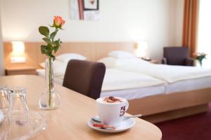 Postel nebo postele na pokoji v ubytování Hotel Clemenswerther Hof