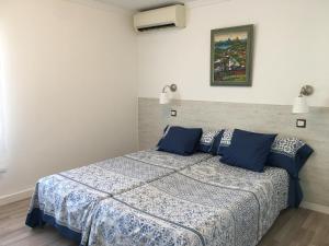Postel nebo postele na pokoji v ubytování Casa del Sol