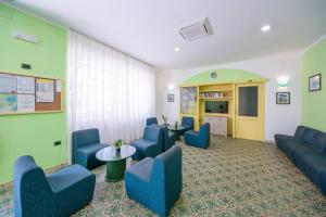 Гостиная зона в La Residenza Aparthotel