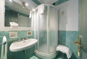 Kylpyhuone majoituspaikassa La Residenza Aparthotel