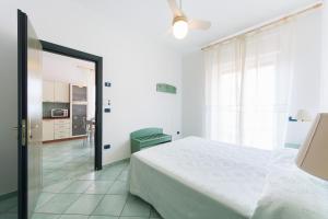 Кровать или кровати в номере La Residenza Aparthotel