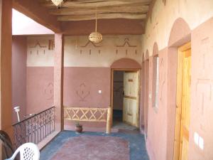 a hallway of a house with a ceiling at Auberge Des Jardins du Dades in Boumalne
