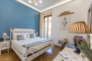 Posteľ alebo postele v izbe v ubytovaní Royal Suite Trinità Dei Monti + 37 fotografií