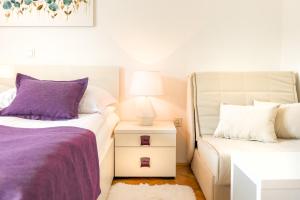 Letto o letti in una camera di B&B Aurora