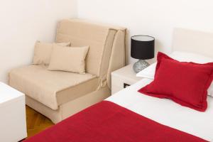 Letto o letti in una camera di B&B Aurora