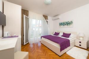 Letto o letti in una camera di B&B Aurora