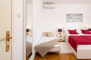 Letto o letti in una camera di B&B Aurora