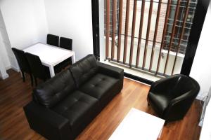 Posedenie v ubytovaní Apartamentos Coronado