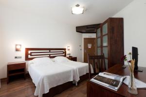Katil atau katil-katil dalam bilik di Casa del Trigo