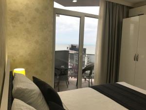 Ένα ή περισσότερα κρεβάτια σε δωμάτιο στο Selfie