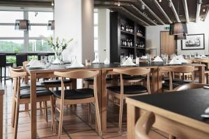 Restoran või mõni muu söögikoht majutusasutuses Milling Hotel Vejle