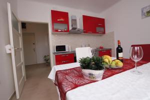 Kuchyňa alebo kuchynka v ubytovaní Apartman Seaside Paradise