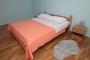 Posteľ alebo postele v izbe v ubytovaní Apartman Seaside Paradise