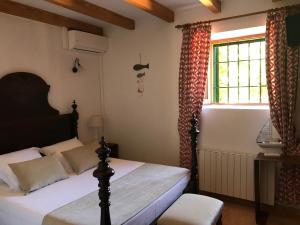 Postel nebo postele na pokoji v ubytování Agroturisme Son Barceló Mas