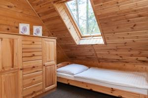 Postel nebo postele na pokoji v ubytování Adria Domki
