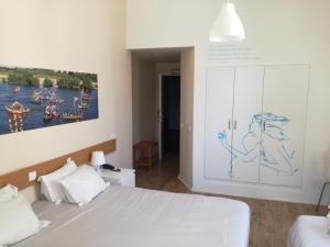 Postel nebo postele na pokoji v ubytování Casa João Chagas Guesthouse, Constância, By Viva a Vida - Alojamentos e Hotels