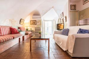 Posteľ alebo postele v izbe v ubytovaní Piazza Colonna Apartment - Charme Holidays