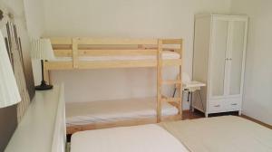 Postel nebo postele na pokoji v ubytování Apartmány Nová Pec