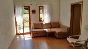 Posezení v ubytování Apartmány Nová Pec